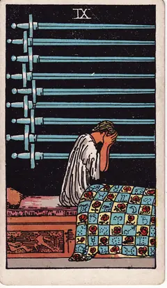 Nine of Swords in the classic 1909 Rider-Waite tarot deck