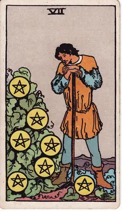 Seven of Pentacles in the classic 1909 Rider-Waite tarot deck